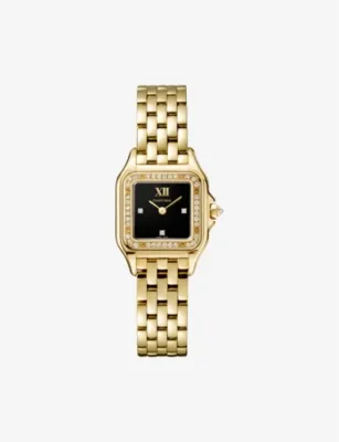 A gold Panthère de Cartier watch on a white ground.