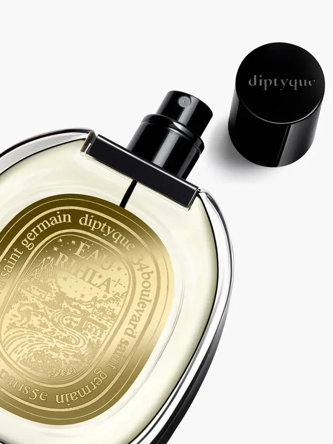 Diptyque Eau Rihla eau de parfum, an amber glass bottle.